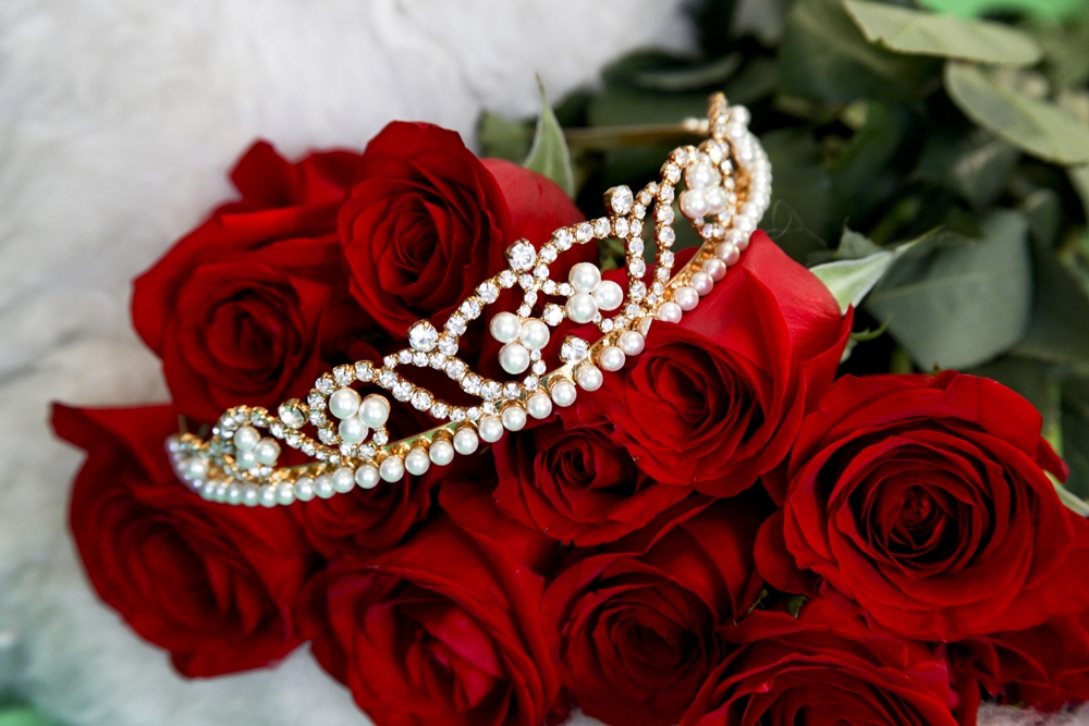 Beauty queen tiara and red roses